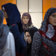 A woman walks past mannequins covered with Islamic clothing designed by Iranian designers while visiting an Islamic fashion exhibition in central Tehran March 1, 2012.